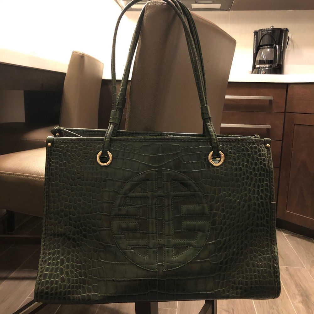 Dark green Antonio Melani purse.